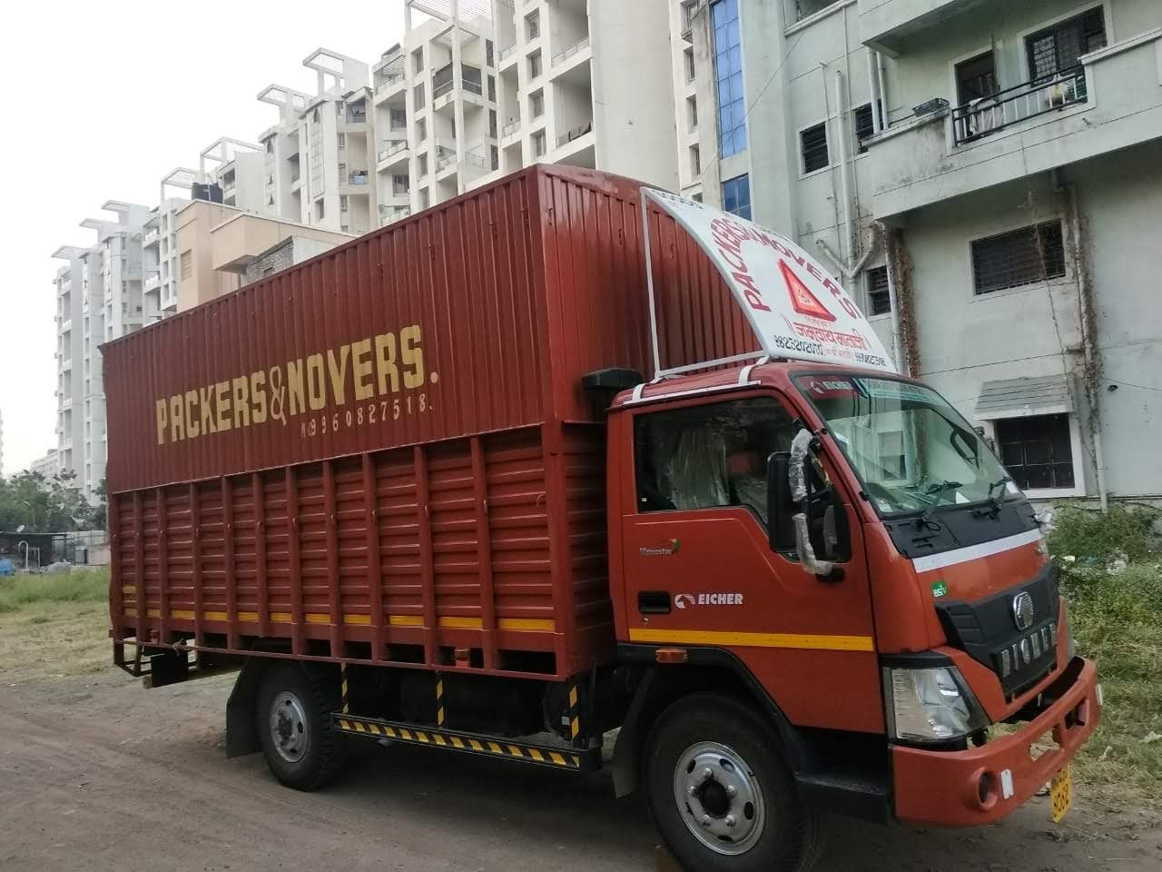 Jasol Packers and Movers dedicated closed-body container truck